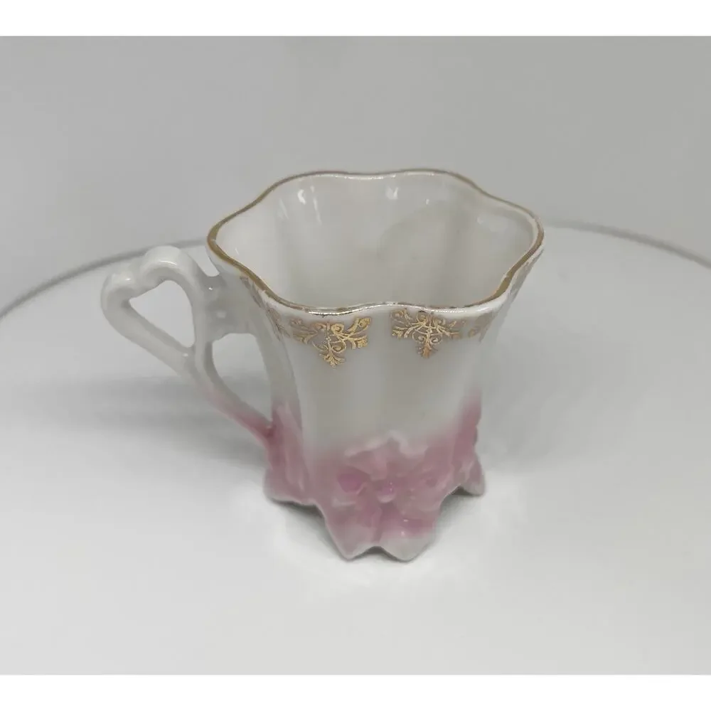 Antique Footed Teacup And Saucer